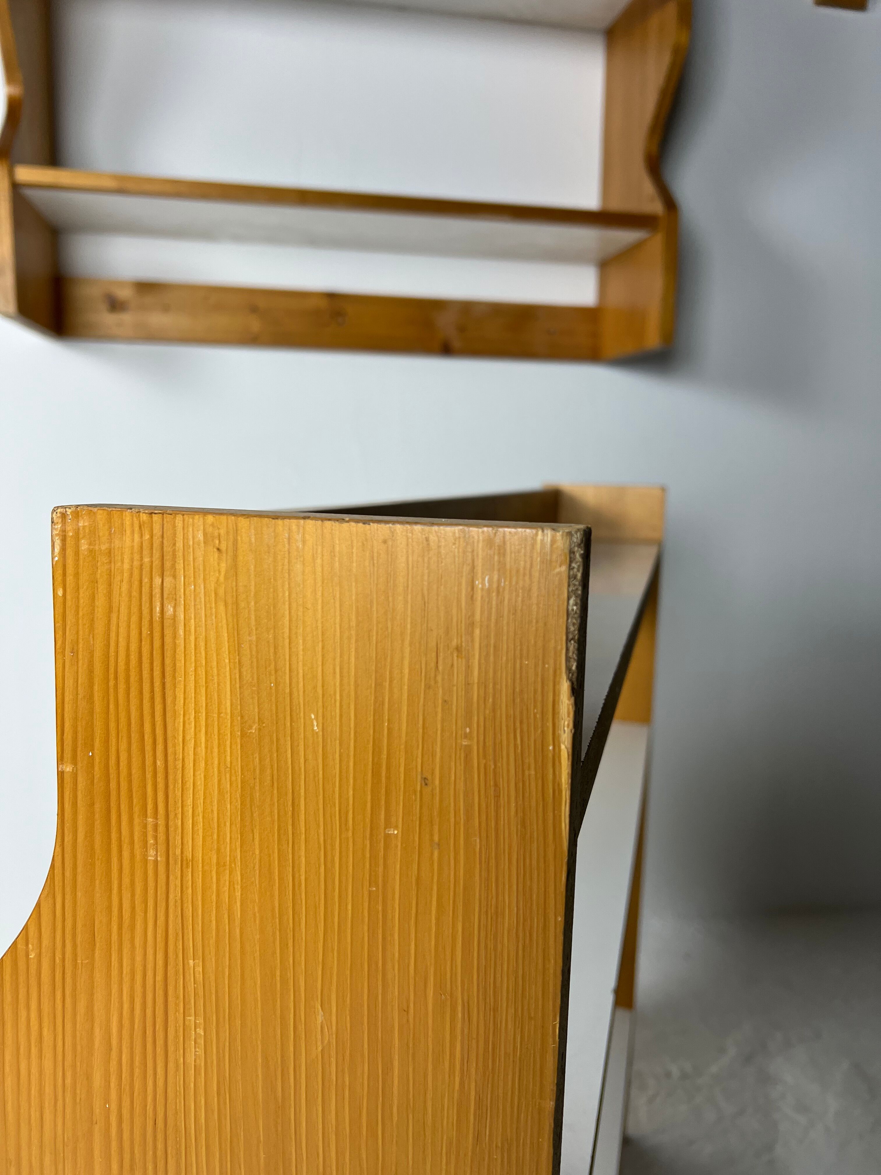 Duo of shelves by Charlotte Perriand