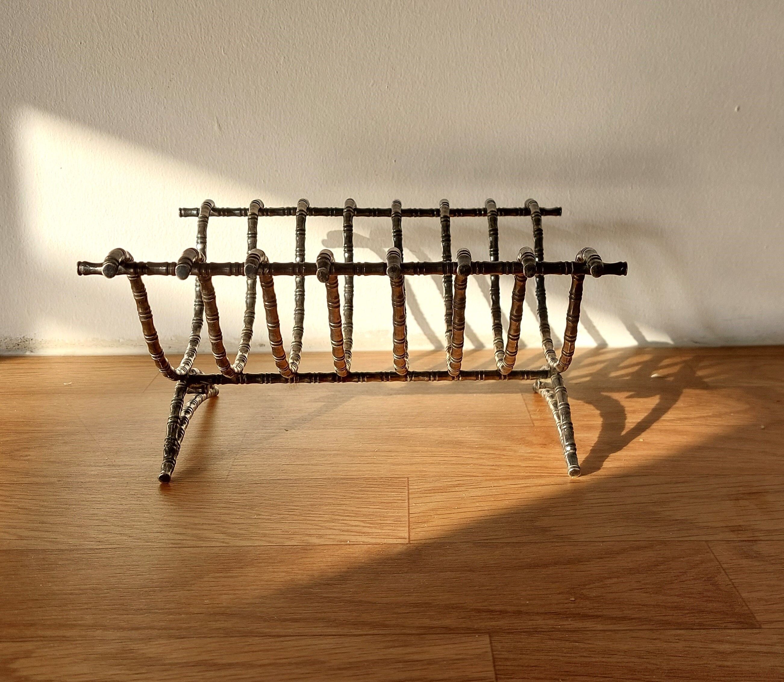 Silver metal cut in imitation of vintage bamboo.