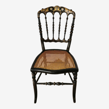 Black chair Napoleon III year, with gilding