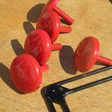 vintage black and red iron coat rack