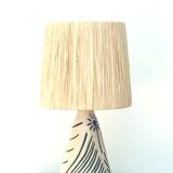White and blue ceramic lamp, raffia shade