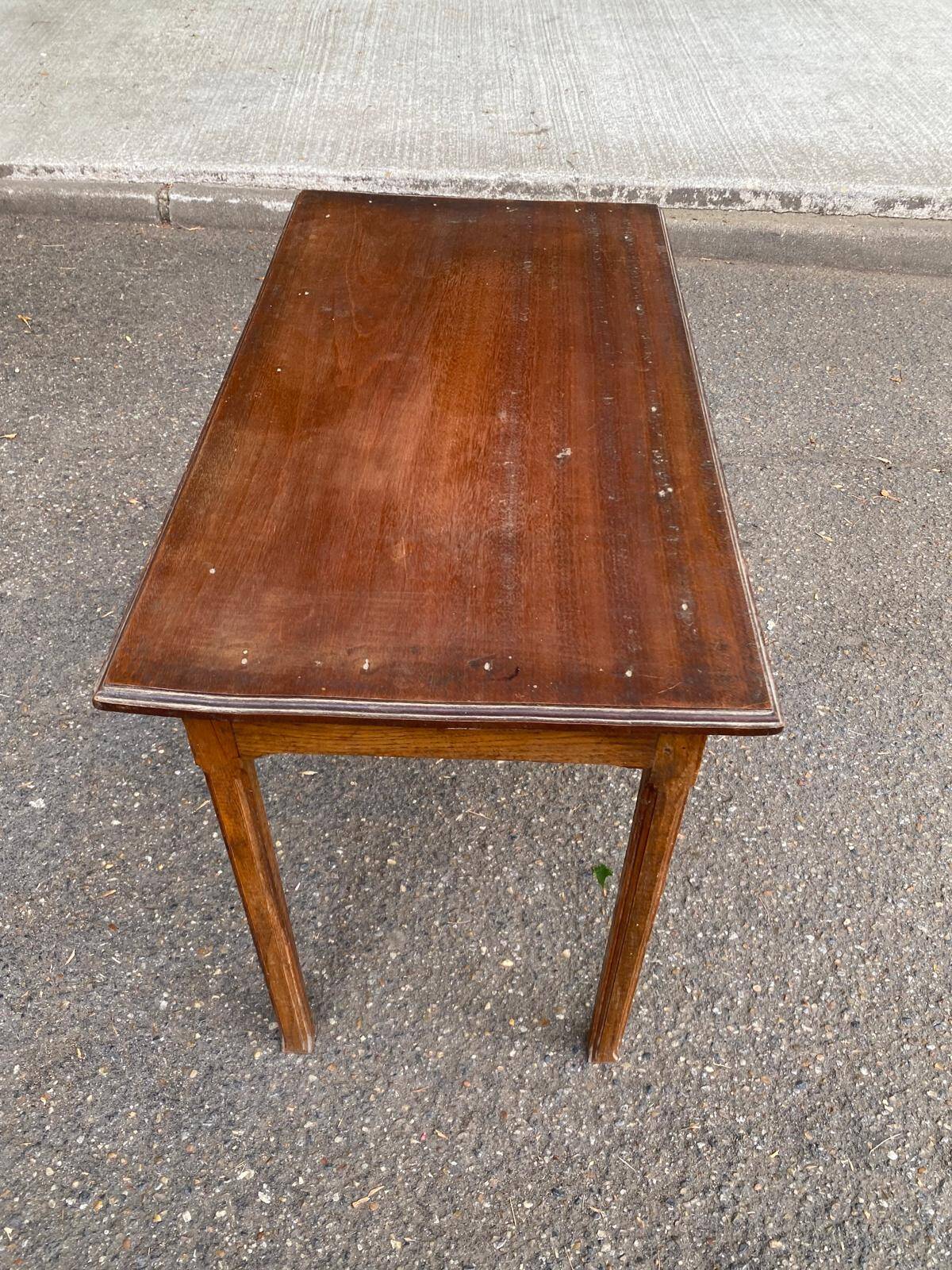 Vintage rectangular side table in solid oak from the 1920s.