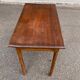 Vintage rectangular side table in solid oak from the 1920s.