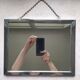Barber mirror with chain.