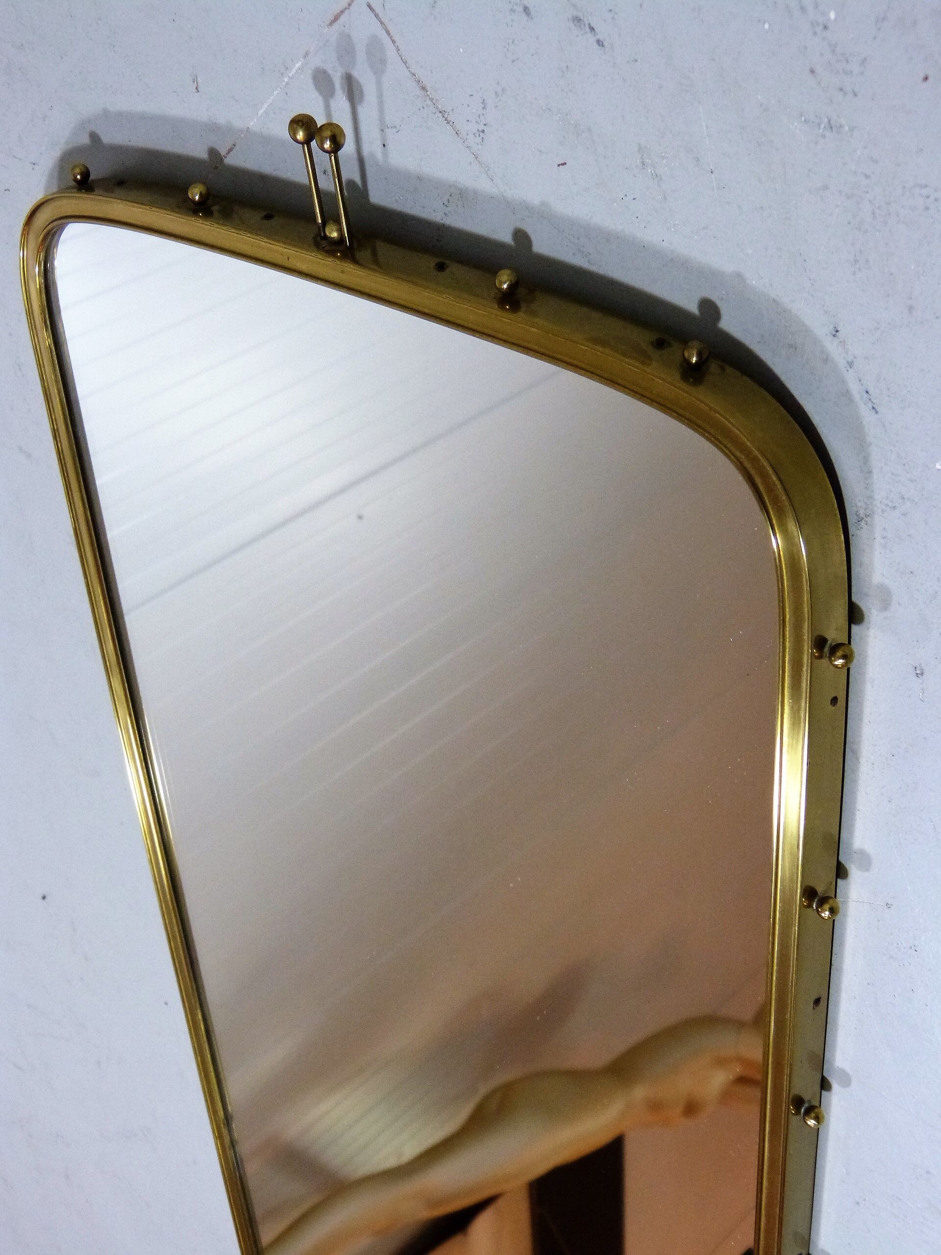 Brass wall mirror by "Münchener Zierspiegel", Germany