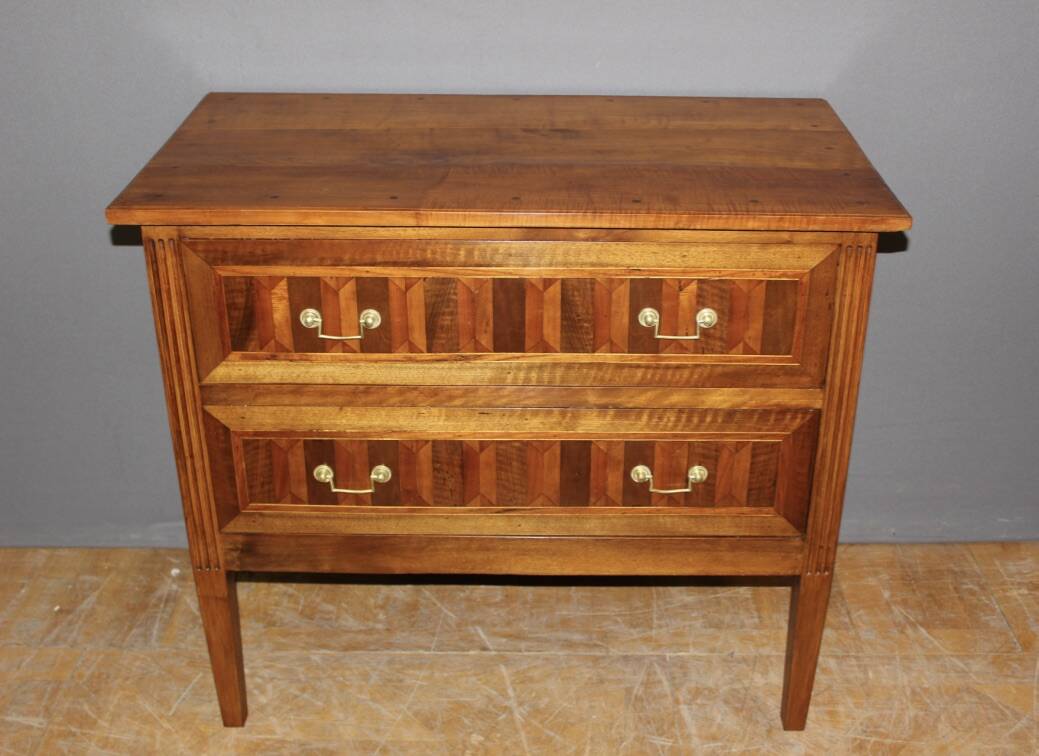 Louis XVI style chest of drawers in walnut and 19th century marquetry