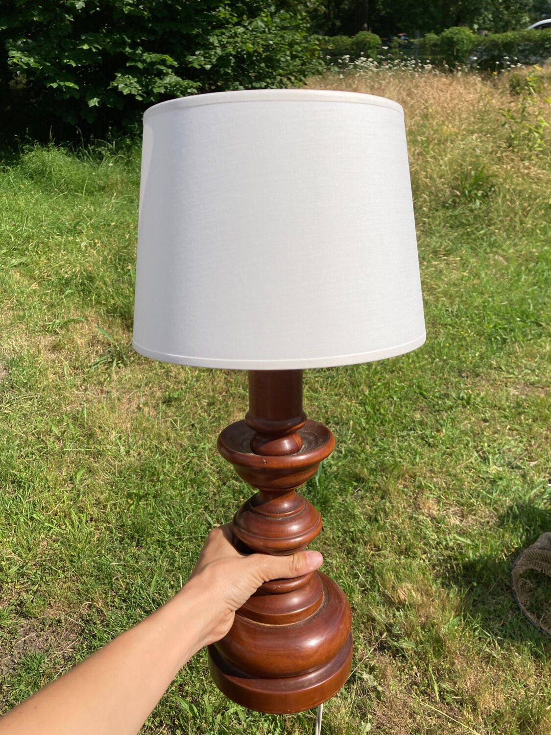 Vintage turned wooden lamp and white lampshade