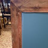 Mirror in golden wood