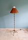 Brass floor lamp with rattan shade, 1950s-60s.