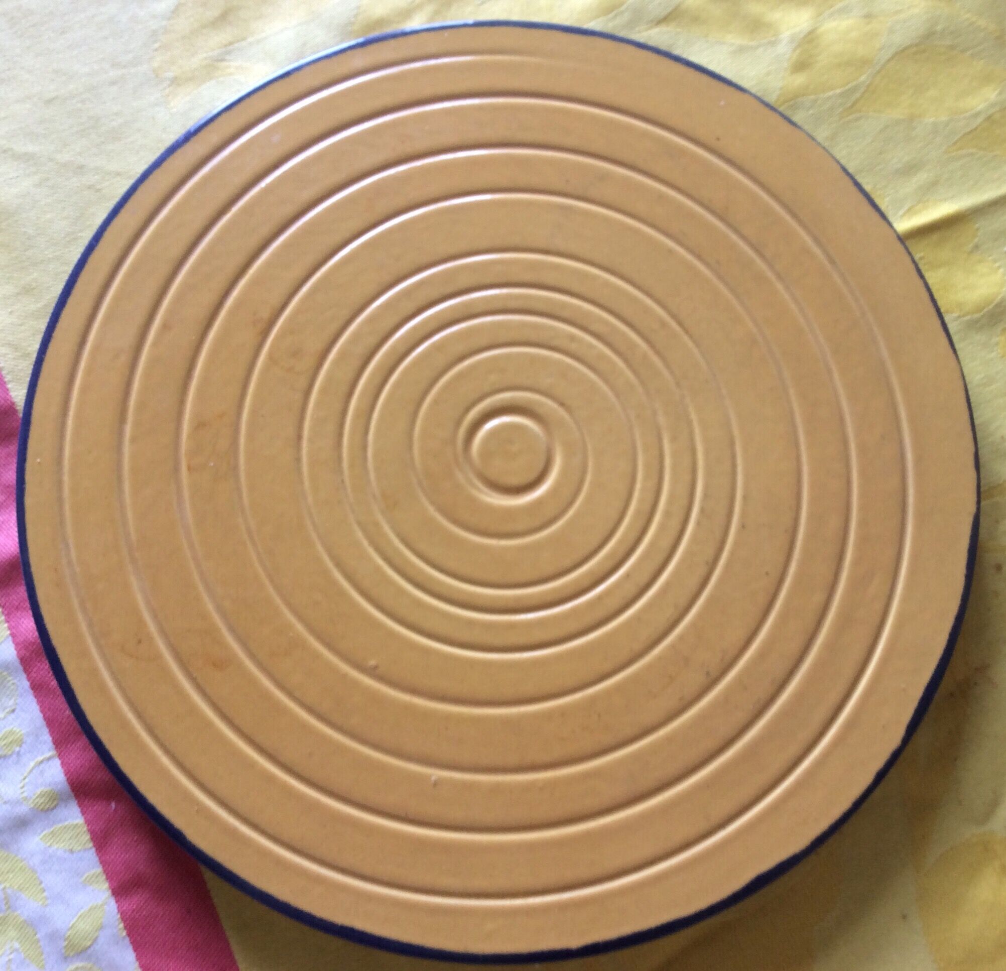 Yellow ceramic trivet