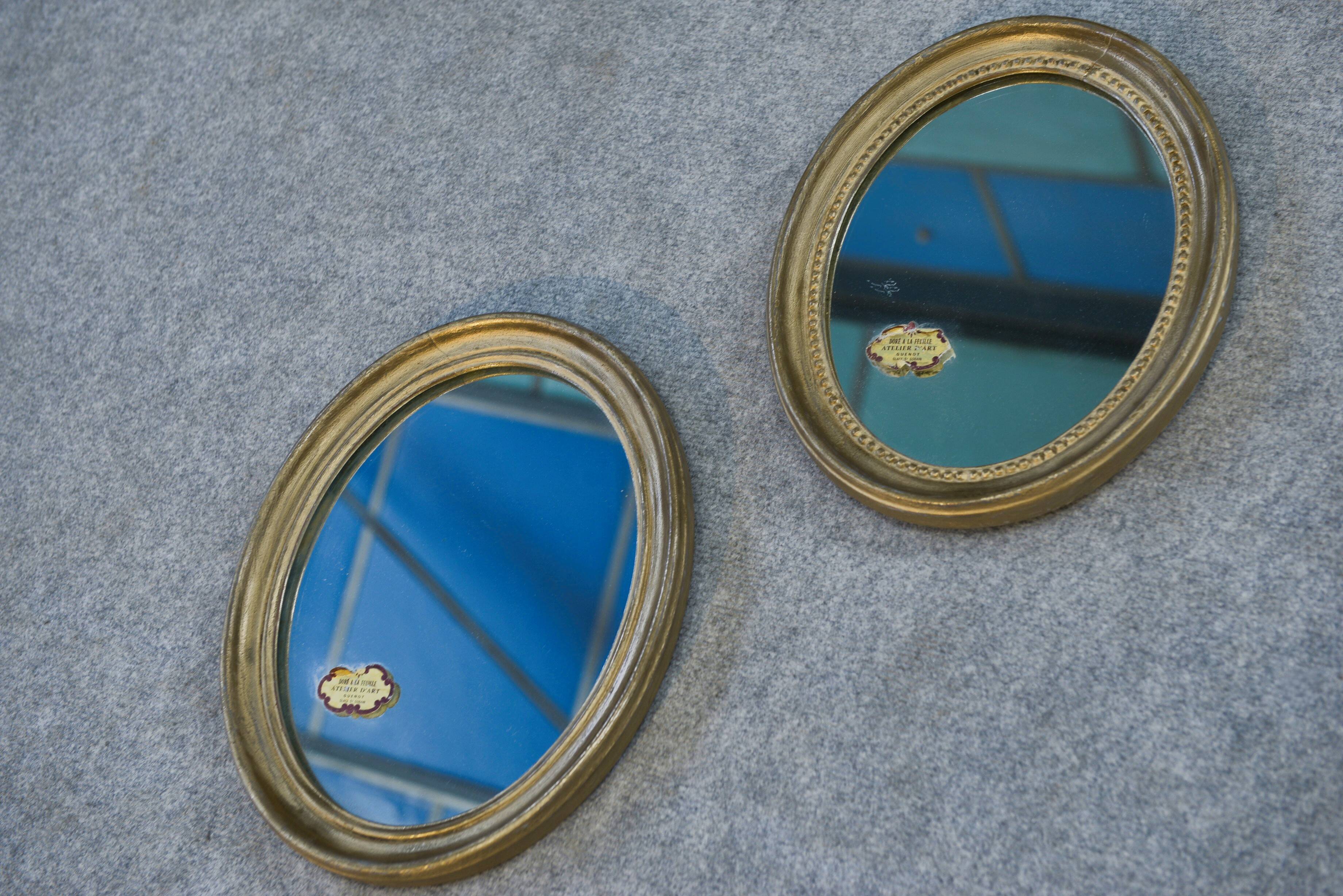 Paire de miroirs ovales, 1950