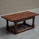 Antique solid oak coffee table in refectory style, 19th century.