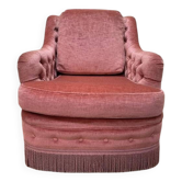 Fauteuil style crapaud en velours rose capitonné