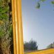 Antique Louis-Philippe mirror, gilded and patinated.