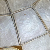 Mother-of-pearl and brass pendant with floral decoration.