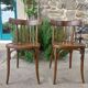 pair of dark bistro chairs, rounded backs, Baumann style