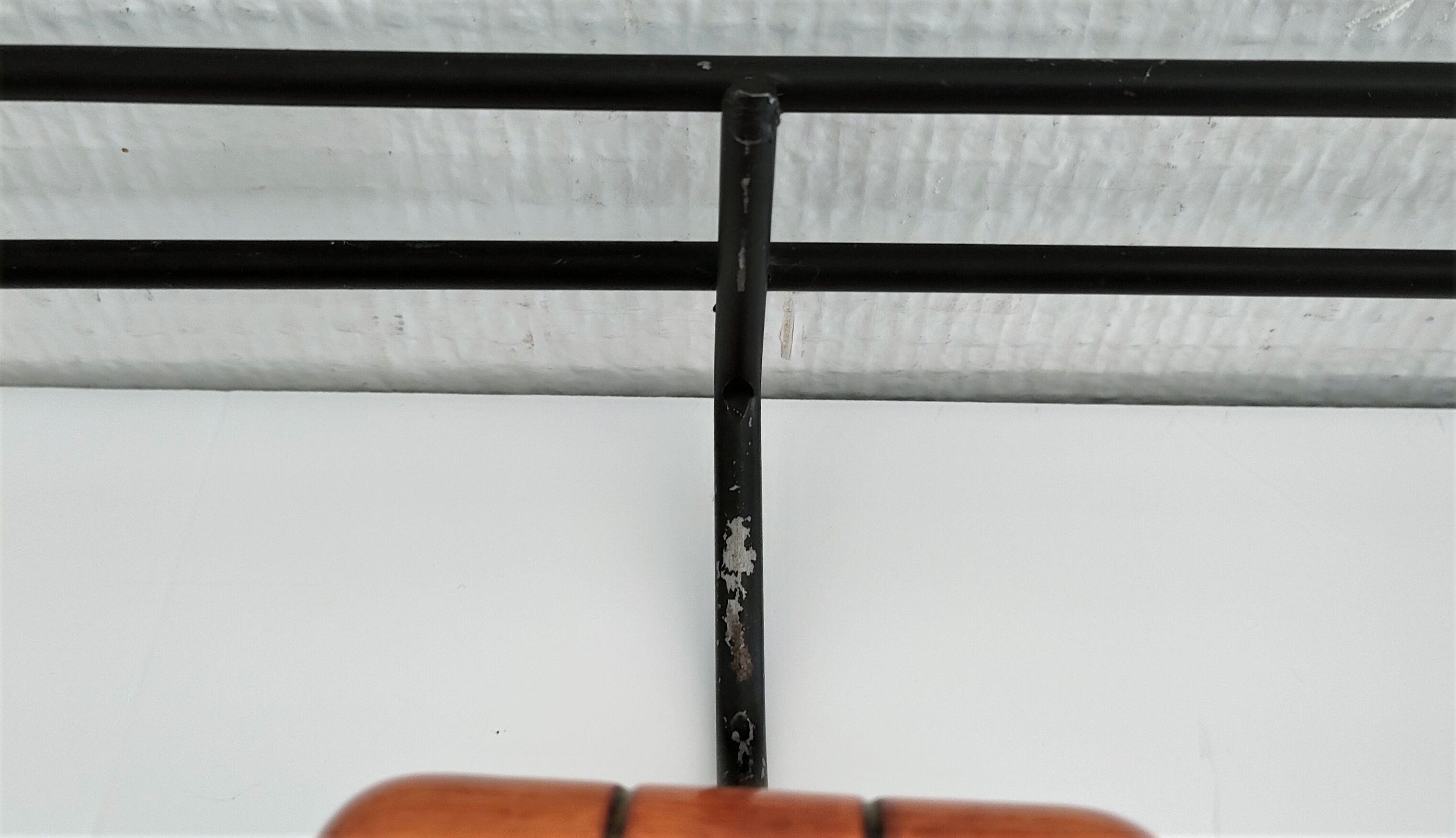 Modernist wall-mounted coat rack in metal and wood, 60s design