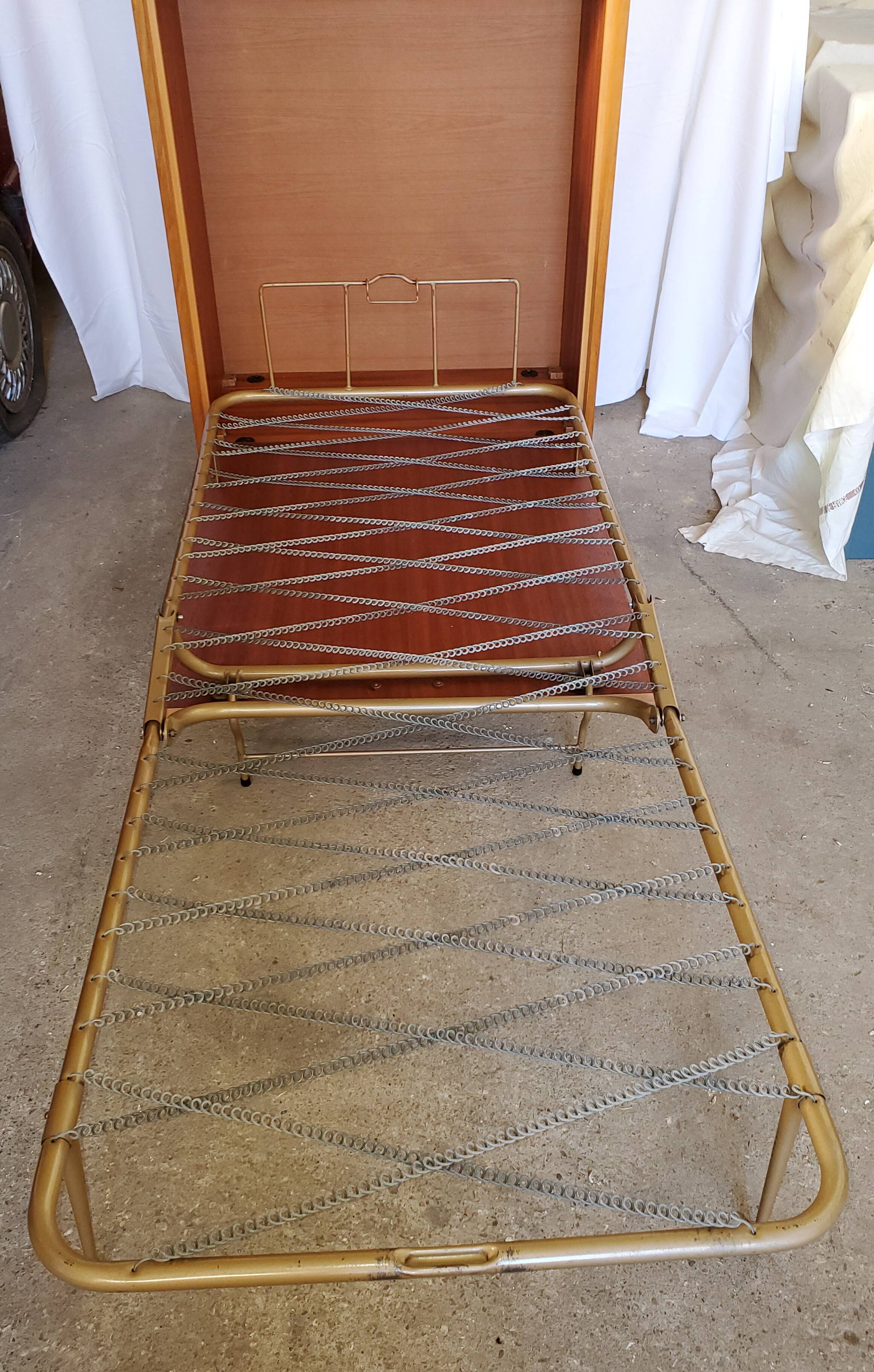Fold bed in a 60's cabinet