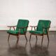 Boomerang chair in green fabric
