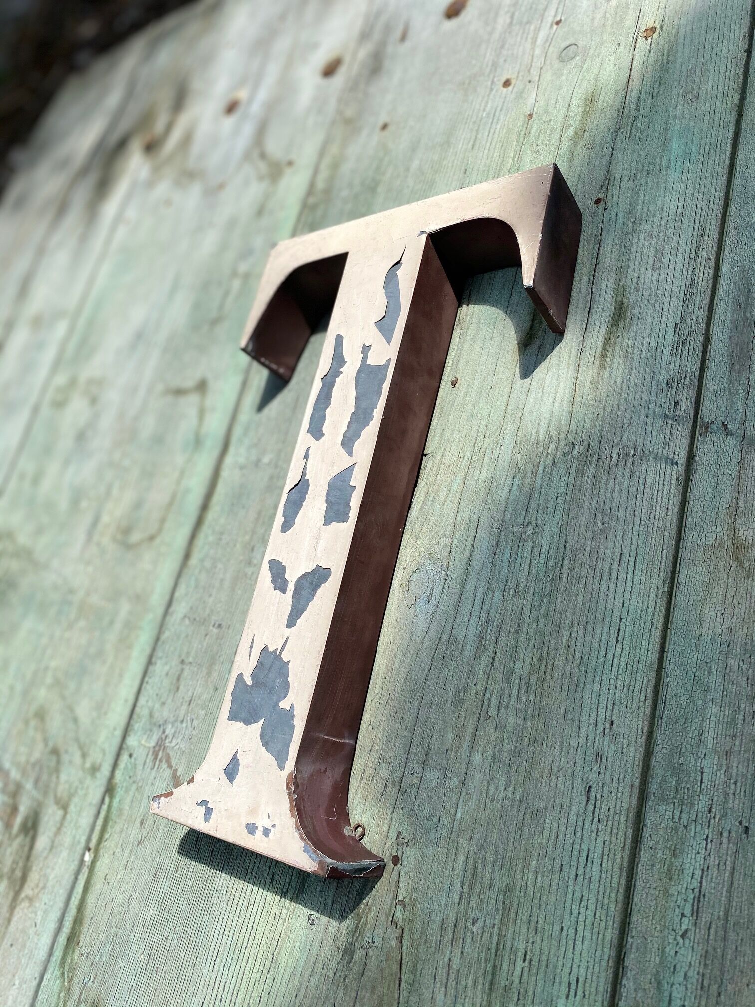 Sign letters forming the word "art"