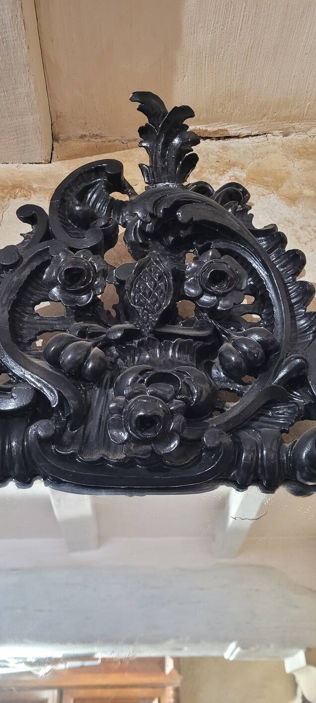 Mirror with carved wooden pediment, late 19th century