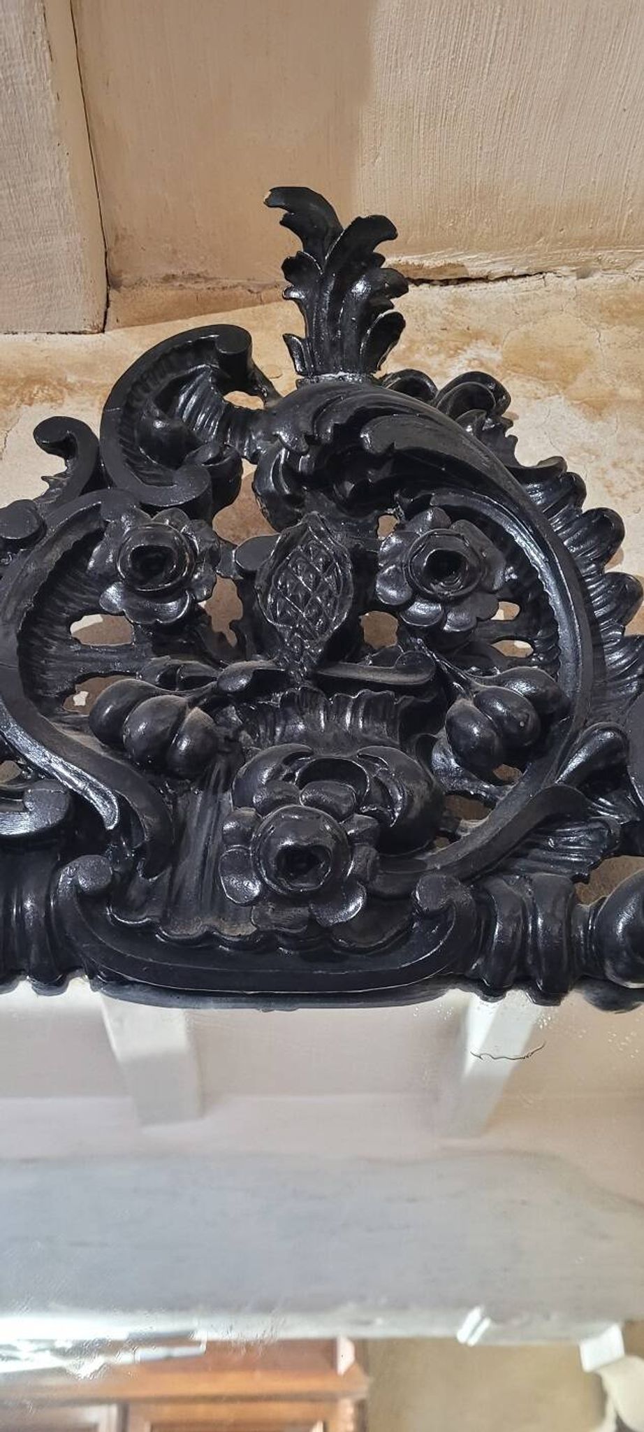 Mirror with carved wooden pediment, late 19th century