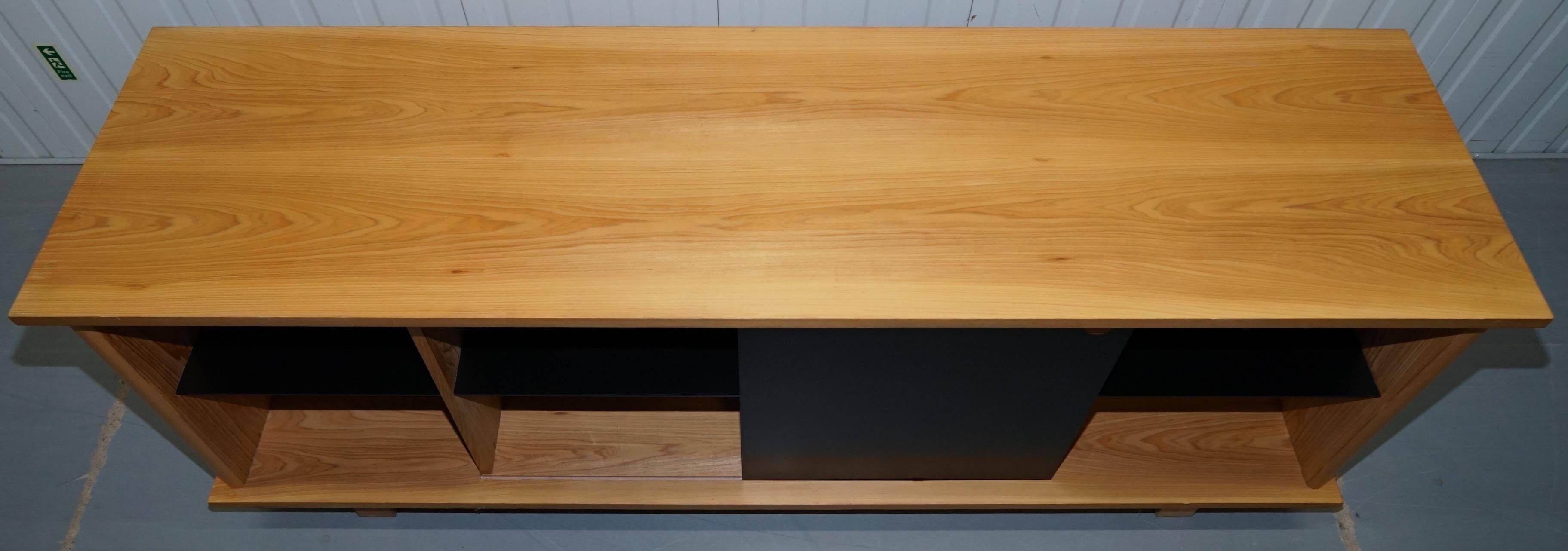 Buffet Ralph Lauren with polished slate stone and rosewood shelves.