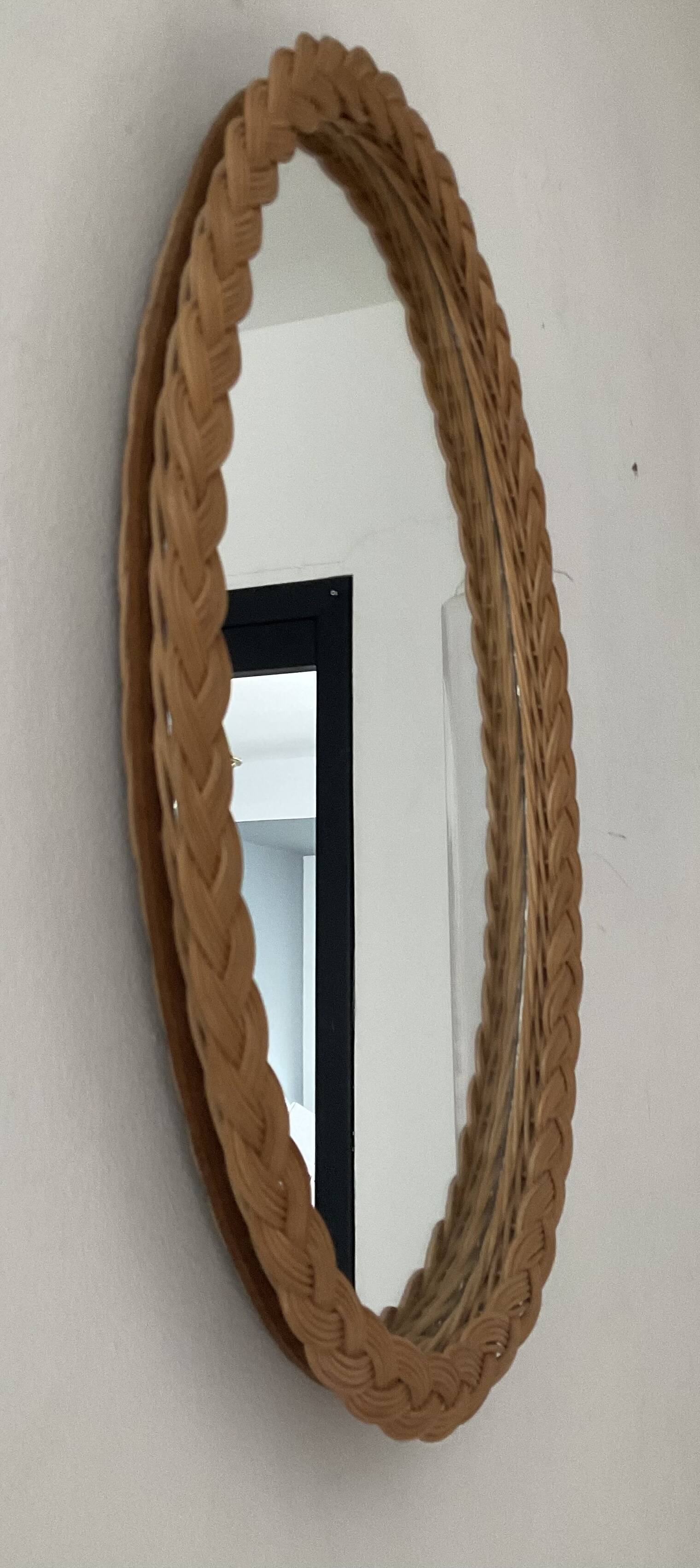 Vintage oval rattan mirror
