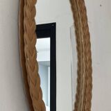Vintage oval rattan mirror