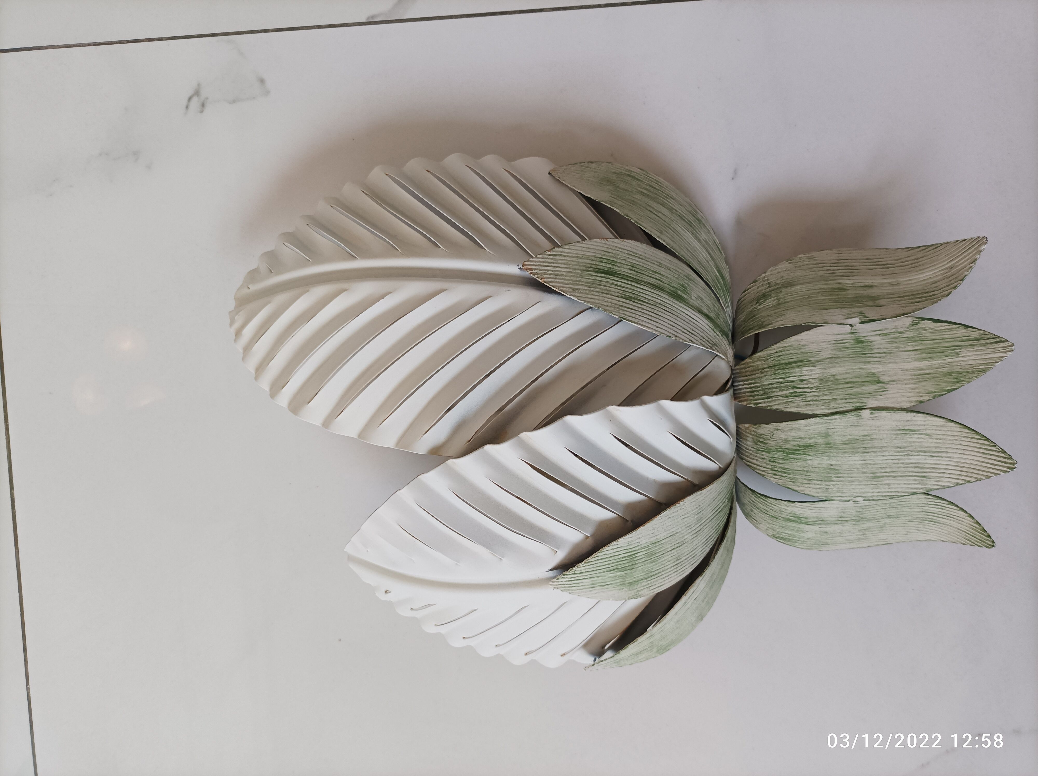 Vintage palm leaf wall lamp
