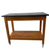 Vintage wooden high table on wheels