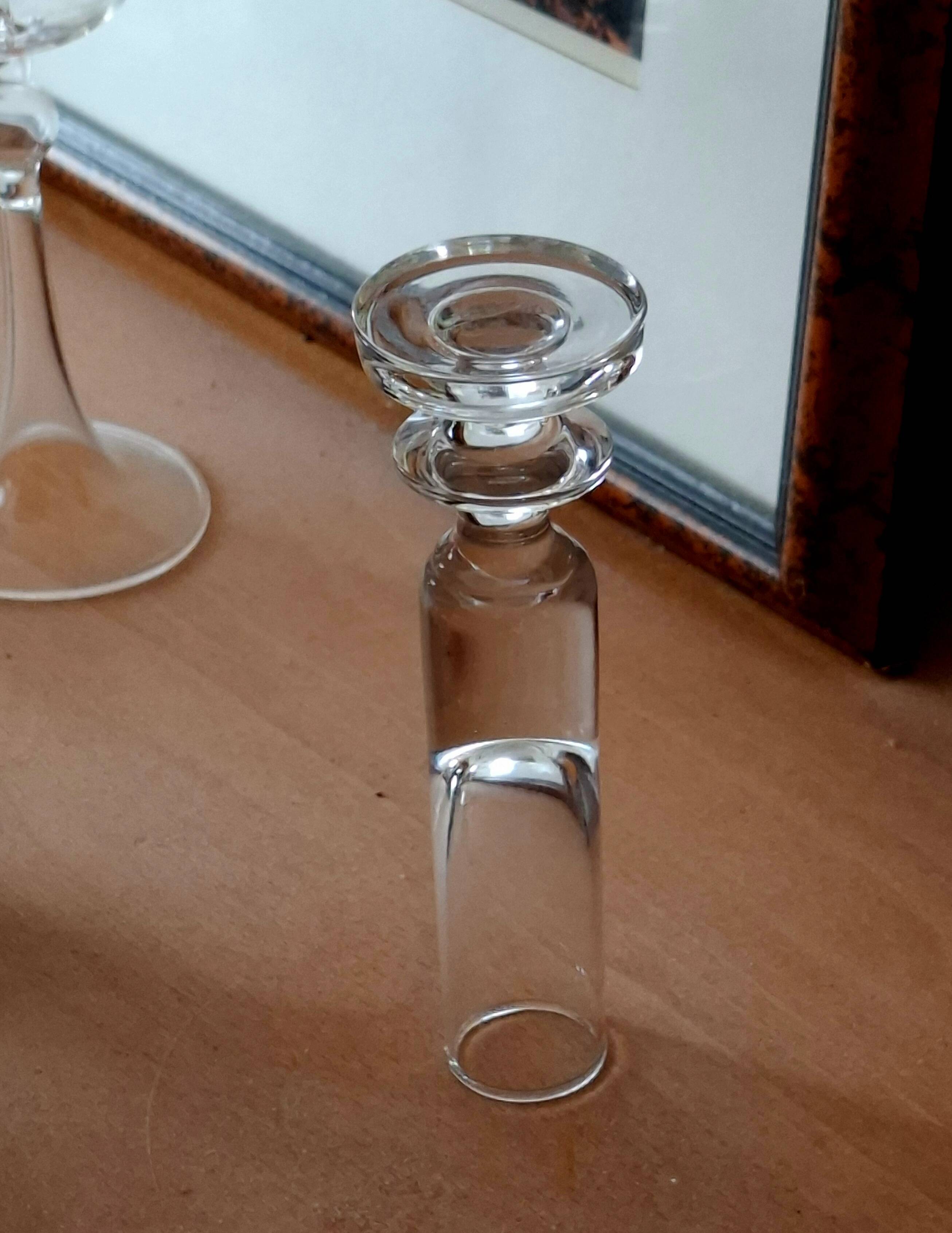 Antique single-stem vase in the shape of a candlestick.