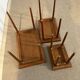 Set of three nesting low tables in a Japanese style, made of mahogany.