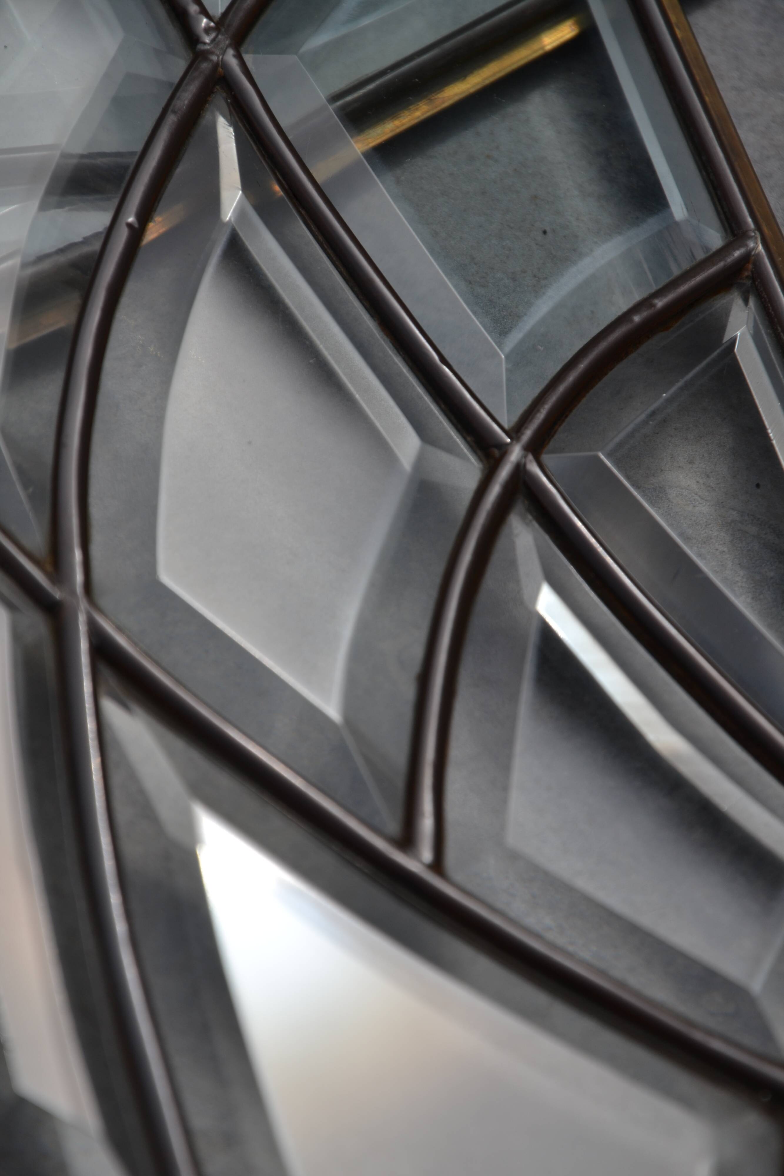 Deux vitraux en verre biseauté et laiton