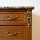 Antique wooden commode with marble and brass.