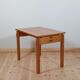 Meticulously crafted vintage pine side table, a masterpiece.