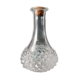 Glass decanter worked effect pimples. Cork stopper