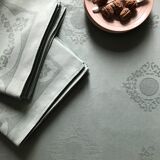 Old damask tablecloth tinted in pastel green