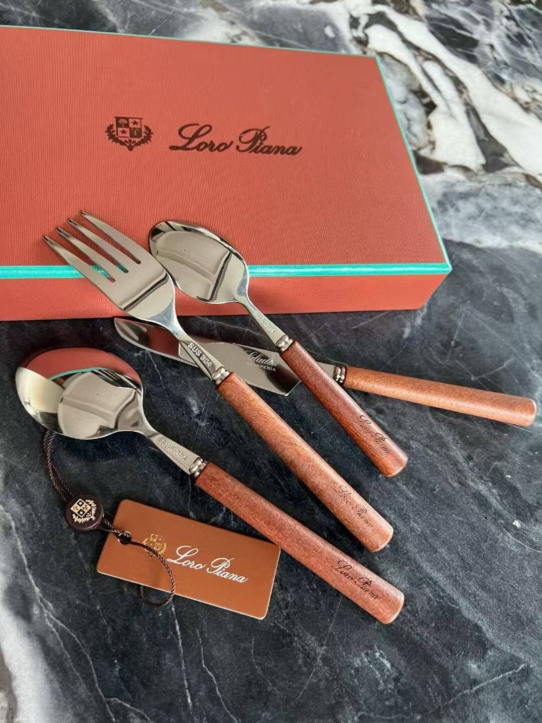 Loro Piana 4-piece mahogany knife and fork set