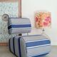 Curved armchair with blue and white stripes
