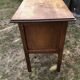 Old oak desk with curved wooden sleepers in the Art Nouveau spirit of the early 20th century.
