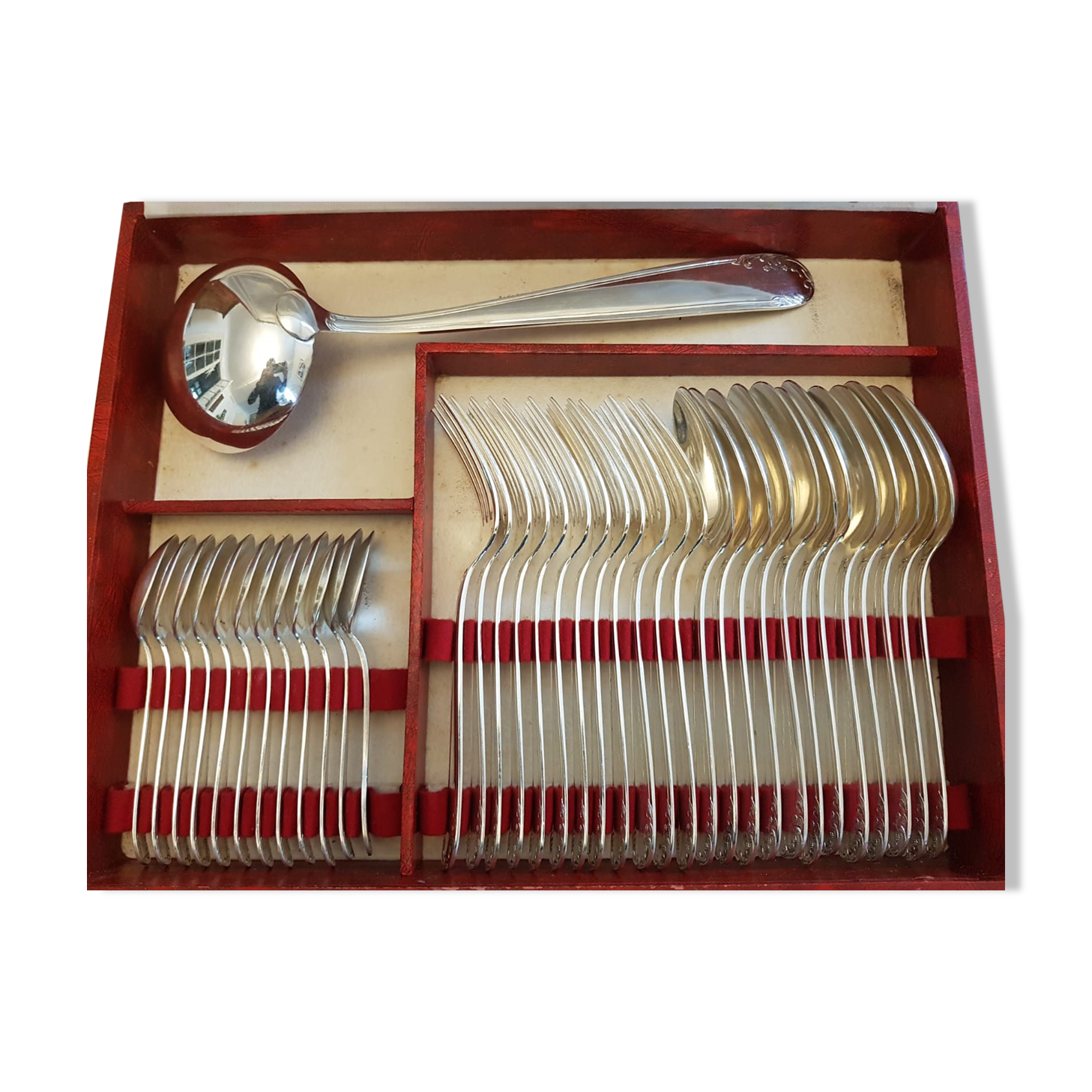 Silver cutlery set with 36 place settings and ladle