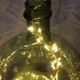 Demijohn old transparent green, estimated capacity around 12 to 15L