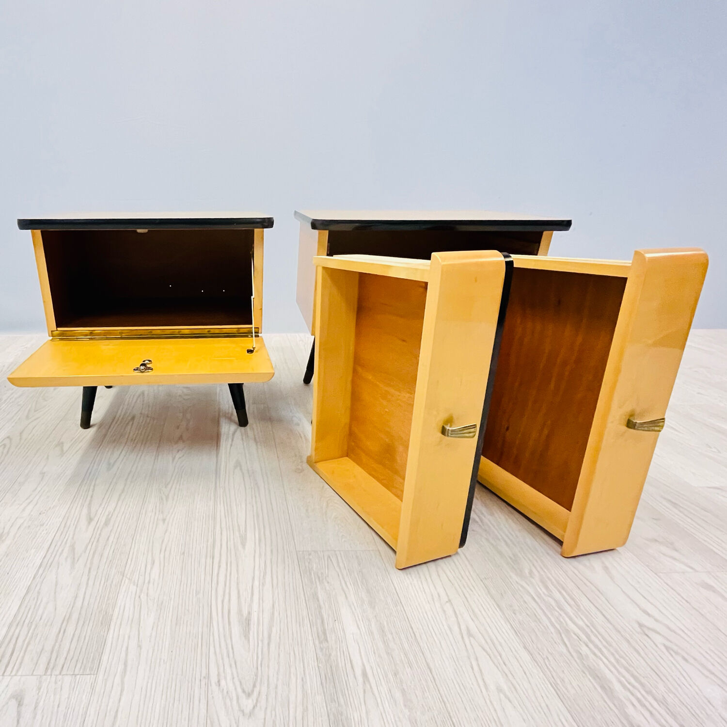 A pair of night cabinets