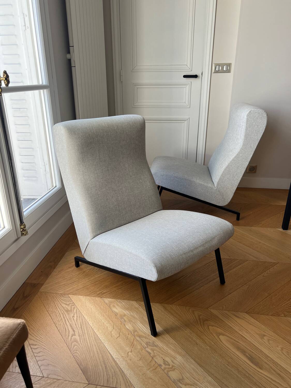 Pair of Pierre Guariche armchairs