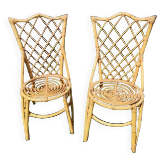 Duo of vintage Louis Sognot wicker rattan chairs