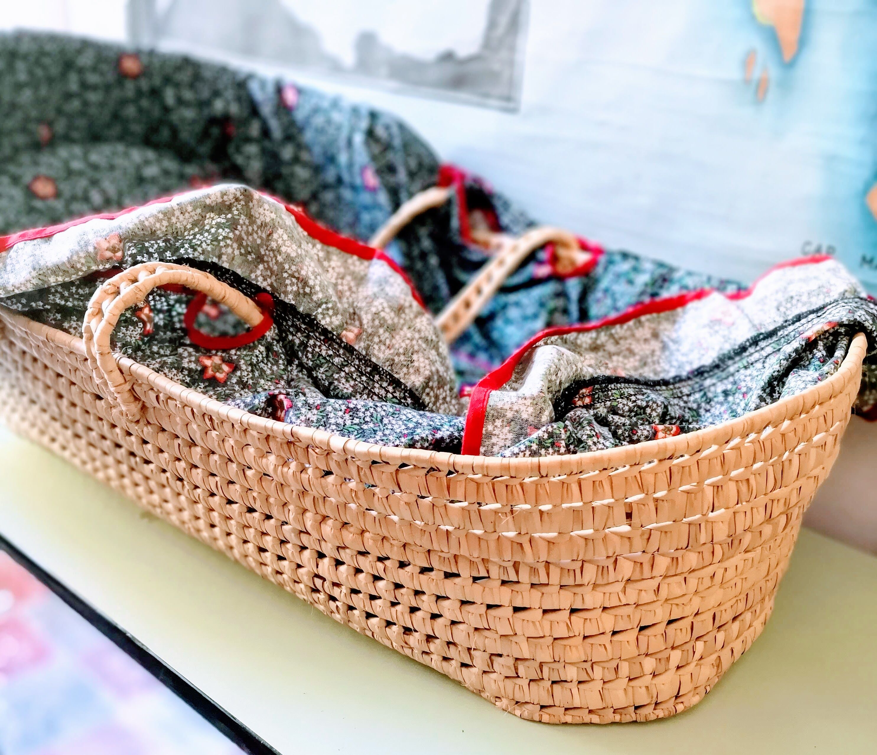 Vintage dressed wicker bassinet
