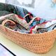 Vintage dressed wicker bassinet