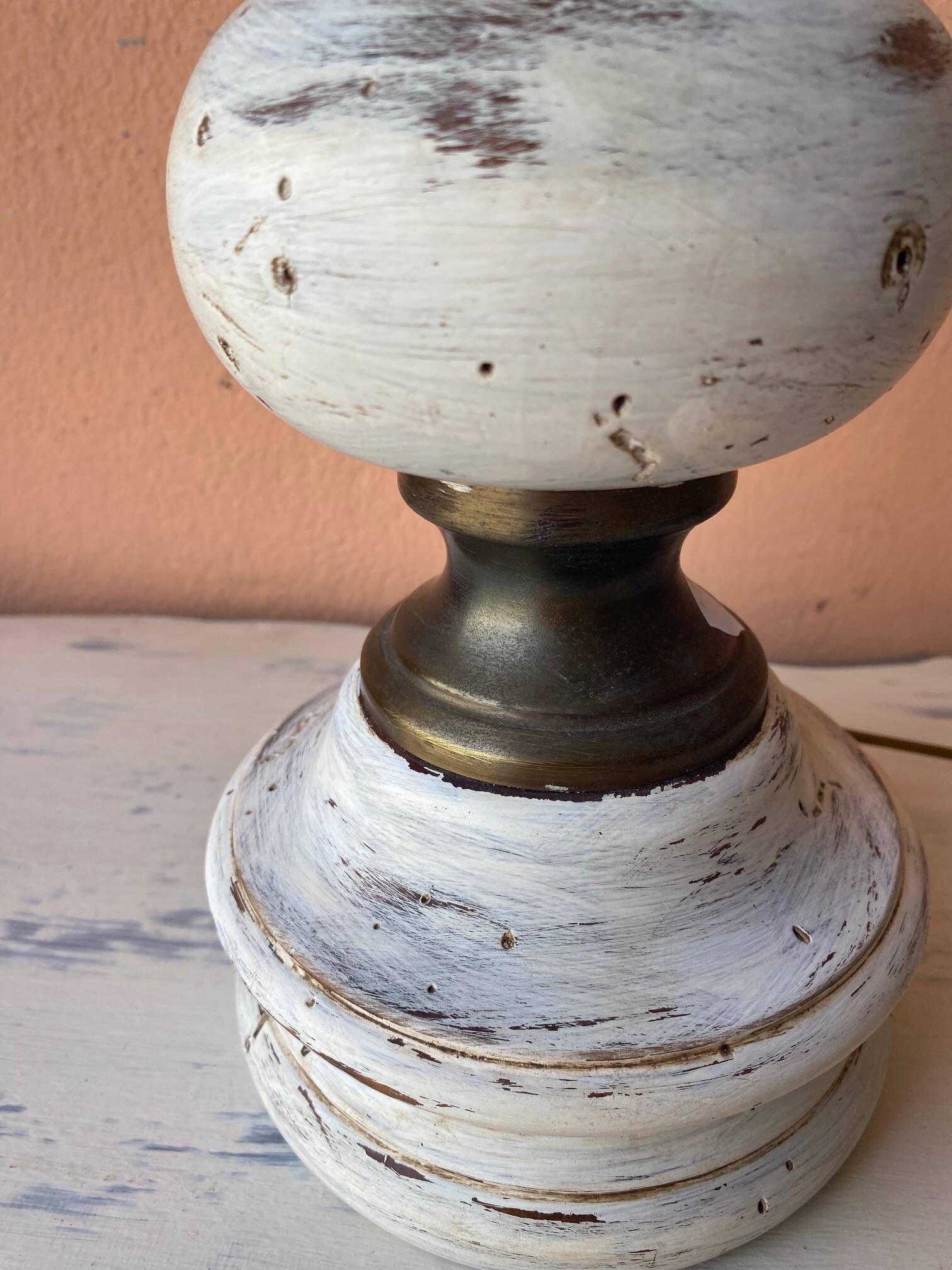Round lamp base in white patina wood and brass