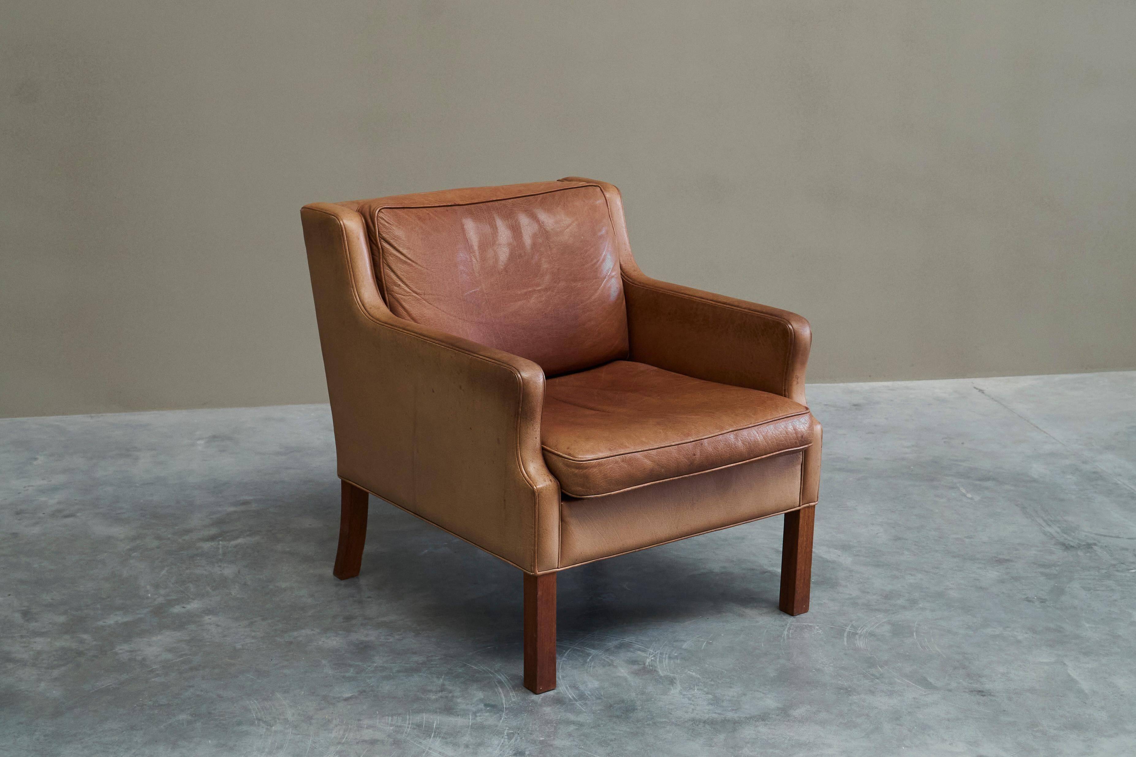 1970s patinated leather Scandinavian lounge chair